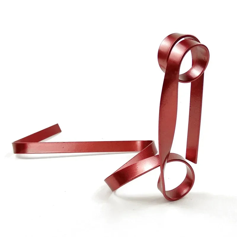 Ribbon-shaped metal wine holder